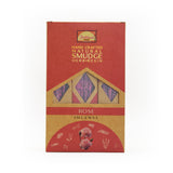 A rectangular box of Parimal's Hand Crafted Natural Smudge Herb Resin in the 'Rose' scent, featuring a red and kraft paper design with a window displaying purple patterned resin strips.