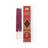 Five pink and black patterned rose incense sticks next to their red and gold packaging box on a white background.