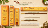 Yatra natural incense stick packaging and size comparison chart on a beige background, showing boxes and sticks with dimensions and decorative botanical elements.